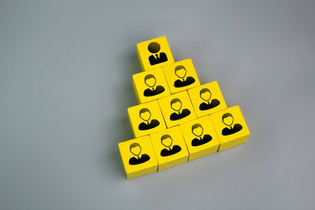 colored cube with hiaraki worker arrangement and leader above. Human resources, corporate hierarchy...