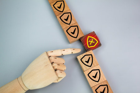 wooden squares with protection and non-protection icons. safe and unsafe concepts. secure and not...