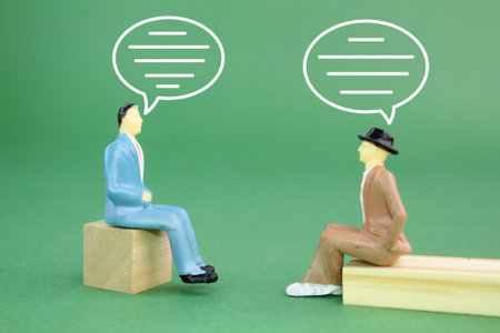 two men are chatting or discussing. silhouettes and talking bubbles. Communication and communication, meeting placeの写真素材
