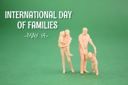 miniature family with the words INTERNATIONAL DAY OF FAMILIES. family day concept