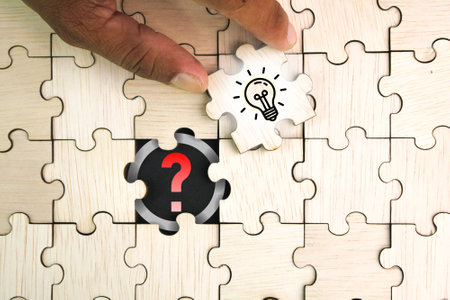 wooden puzzle with question mark icon and idea. solution concept. questions and answers. Q and A...