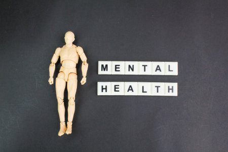 human model with mental health alphabet word. mental health conceptの写真素材