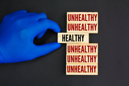 hand choose healthy words among unhealthy words. the concept of healthy and unhealthy. the concept of food selectionの写真素材