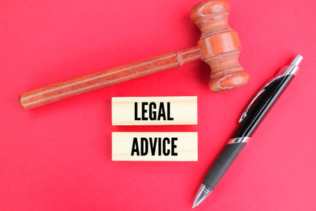 judge's hammer and pen with the word legal advice. concept of legal adviceの写真素材
