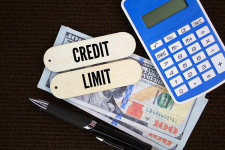 pen, calculator and paper money with the word Credit limit. credit or business conceptの写真素材