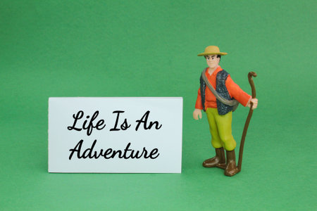 a traveler with the quote life is an adventure. the concept of life's adventure