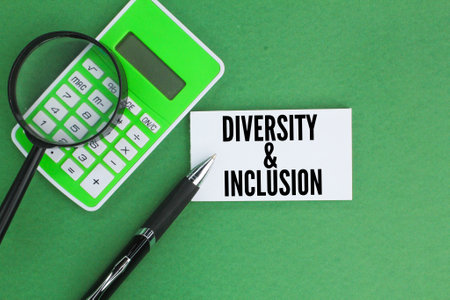 pen, calculator, magnifying glass and paper with the words Diversity And Inclusion