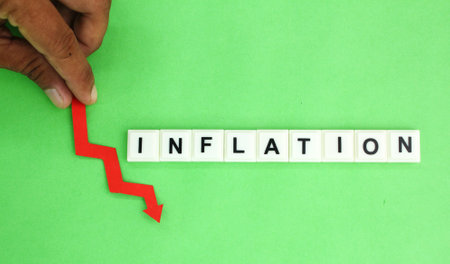 red arrow and the word inflation alphabet letters. the concept of inflation in business