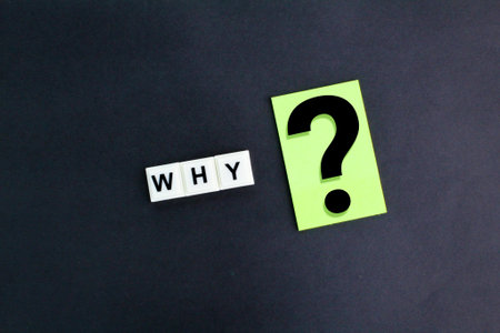 letters of the alphabet with the word why and a question mark. the concept of questions or Faqの写真素材