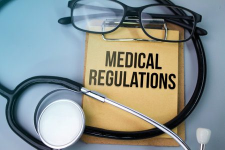 stethoscope, glasses and a blackboard with the words medical regulations. concept of rules and...