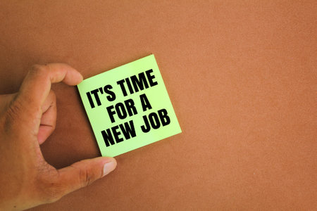 colored paper with the words It's Time For A New Job. new job concept.の写真素材