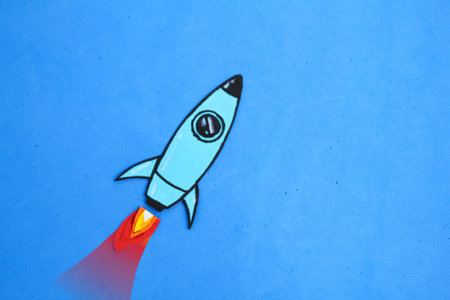rocket launch begins. new product launch concept. The launch into space. Flying rocket through the clouds. Start up of the space rocket.の写真素材