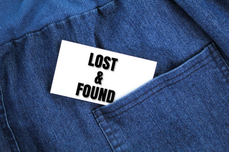 cloth and white paper with the words lost & found. the concept of lost and found. looking for something valuableの写真素材