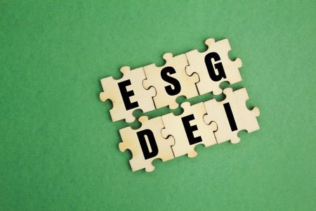 puzzle with the letters ESG or Environmental, social, and corporate governance and DEI or the word Diversity Equity and Inclusion. ESG and DEIの写真素材