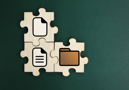 wooden puzzle with file and folder icons. the concept of saving files to folders. document...