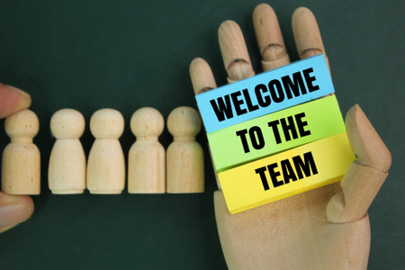 colored paper with alphabet letter words welcome to the team. the concept of hiring new employees. teamwork conceptの写真素材