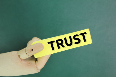 colored paper with the word trust. trusted concept. business concept