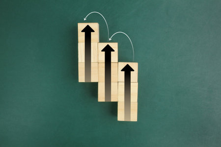 wooden cube with arrow increasing up. profit, benefit, income, business growth process, technology...