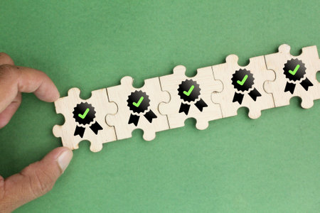 wooden puzzle with certified icons. the concept of service quality commitment. iso certified...