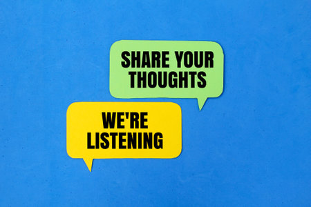colored paper conversation box with the words share your thoughts and we're listening
