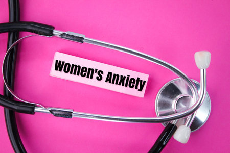 steyrscope and colored paper with the word women's anxiety. women's anxiety conceptの写真素材