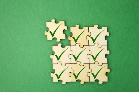 wooden puzzle with correct sign icon. correct education. the concept of finding the right sign....
