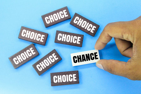 colored sticks with the word choice or change. hand choose change. the concept of choice in life