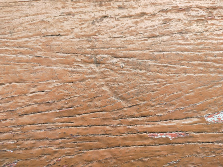 old brown paint that has peeled off the wood. faded brown paint backgroundの写真素材