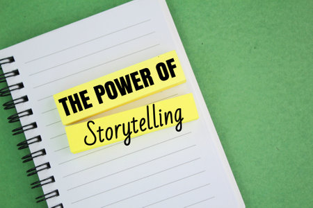 books and colored paper with the word THE POWER OF STORYTELLINGの写真素材