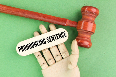 judge's hammer and Dr. stick with the word pronouncing sentence. court conceptの写真素材