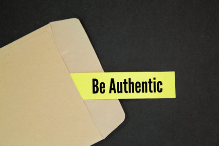 envelopes and colored paper with the word BE AUTHENTIC.の写真素材