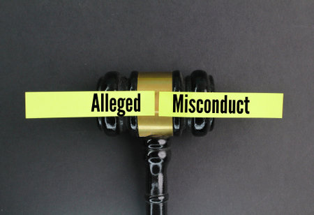 hit the judge and colored paper with the word alleged misconductの写真素材