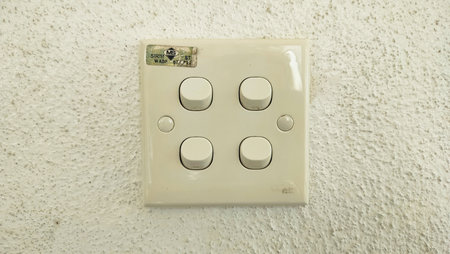 Malaysia, Kuala Terengganu 26 June 2024 : four fan switch buttons or light switches. Four light...