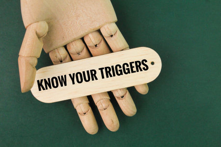 stick with the words KNOW YOUR TRIGGERSの写真素材