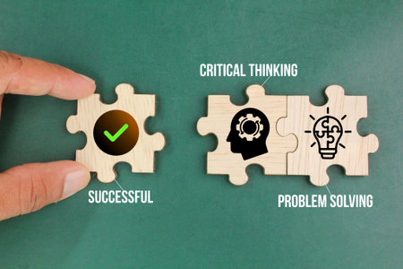 wooden puzzle with icons and the words Critical thinking and problem solving. skills to be successful.の写真素材