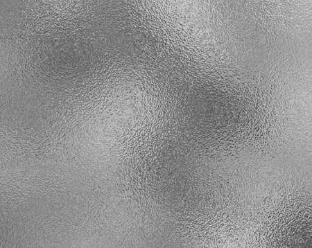 Gray foil glass texture background. Abstract gradient bright light reflection and shiny rough texture surfaceの写真素材