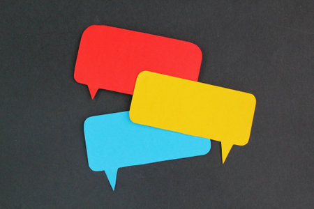 group chat with red blue yellow color. conversation concept. group conversation. speech bubbles.の写真素材