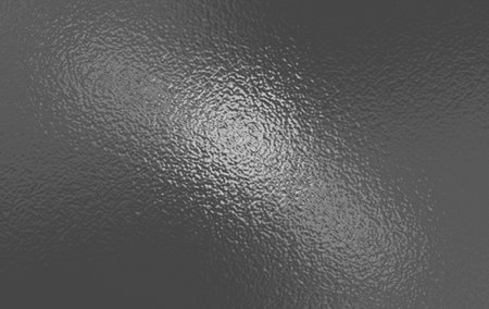 Dark gray foil glass texture background. Abstract gradient bright light reflection and shiny rough texture surface. Glass effect backgroundの写真素材