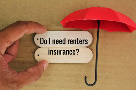 an umbrella with the words Do I need renters insurance? insurance conceptの写真素材