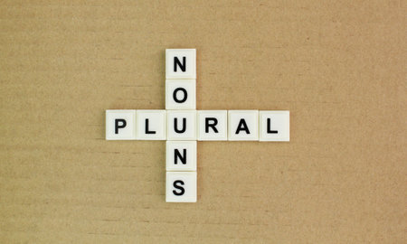 letters of the alphabet are crossed with nouns and plurals. English education concept