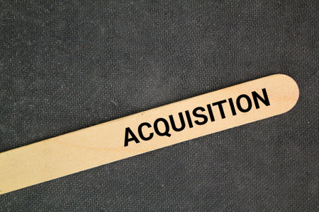 stick with the word acquisition. an asset or object bought or obtainedの写真素材