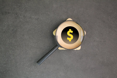 house shape, magnifying glass and money. the concept of finding a home. Business prosperity and asset management concept.の写真素材