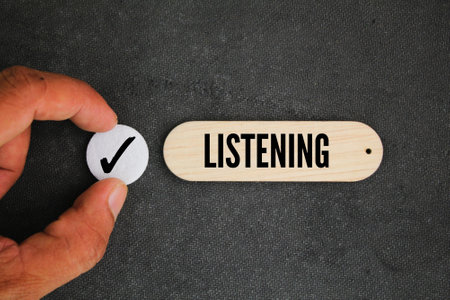 mark correctly with the word LISTENING. the concept of listening or hearingの写真素材