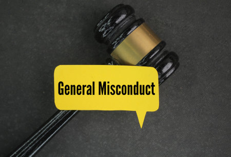 judge's gavel and paper with the words General Misconduct. concept of wrongdoing. behavior that is...