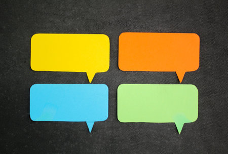 four conversation bubbles with a blue background or isolated background. sample for writing space. copy space for text. speech bubbleの写真素材