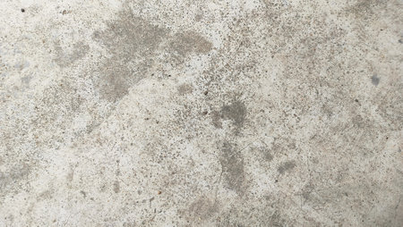 Grungy cement texture background. Spots of white paint on a gray concrete background, texture, photo. old cementの写真素材