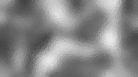 Silver gray foil background, gray platinum metallic texture. Silver gradient background. Foil paper, glitter effect. Chrome metal gray pattern. Gradation noise textureの写真素材