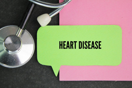 stethoscope and colored paper with the word Heart Disease. among dangerous diseasesの写真素材