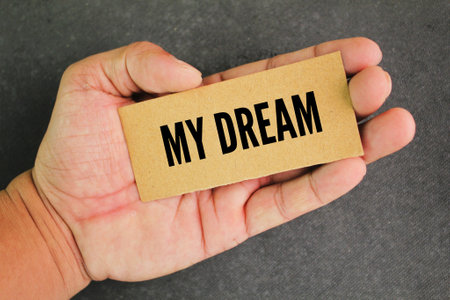 paper in hand with the words my dream. representing unconscious desires and wishesの写真素材