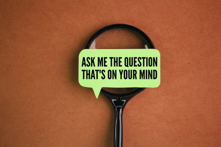 without a magnifying glass and paper with the words ask me the question that's on your mind. the...